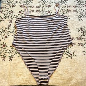 One piece purple , black, and white H&M by divided one piece with snaps